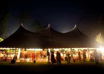Night time wedding tent with stars visible.